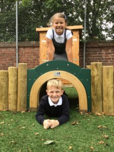 School children using play space