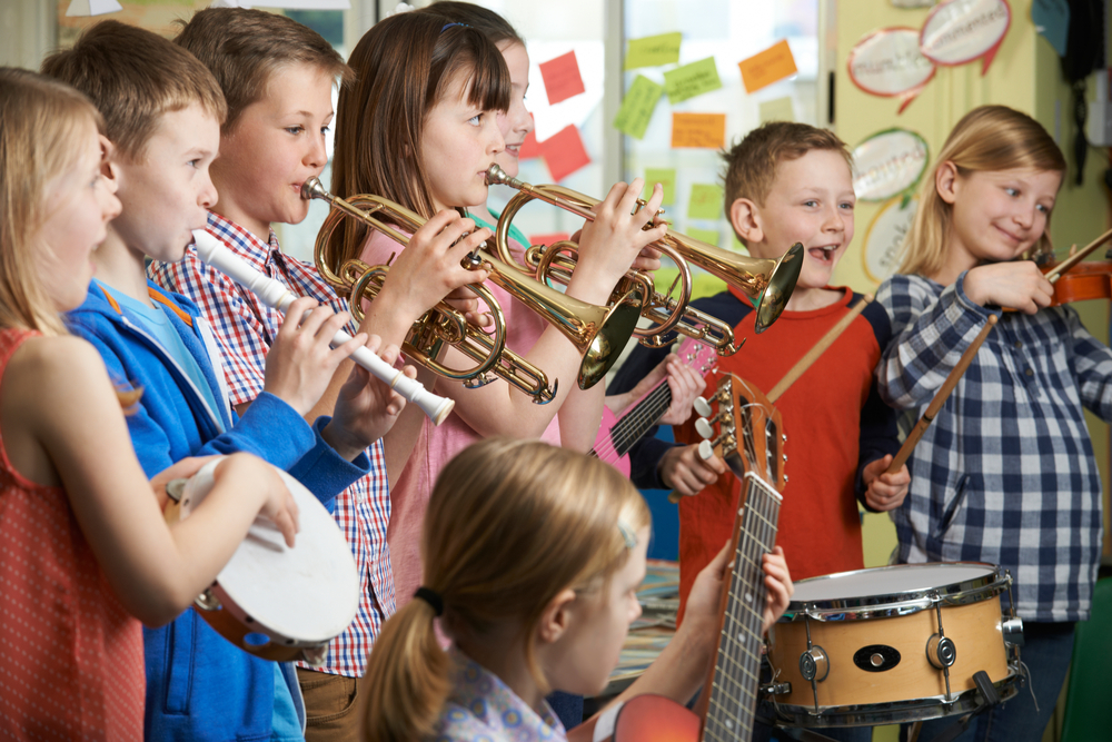 Group of children playing in school band