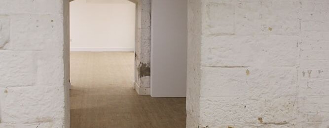 BATH - view of basement corridor new flooring
