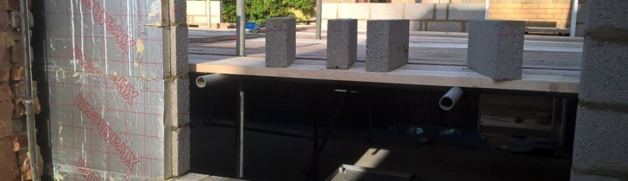 Durham Crematorium - installation of insulation in external brickwork