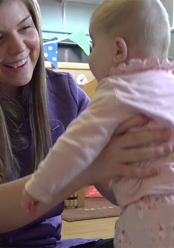 Baby with carer