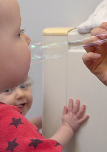 Baby and bubbles