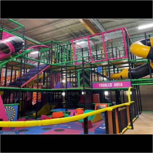 Image of the Abbey Centre Adventure play area featuring colourful soft play apparatus