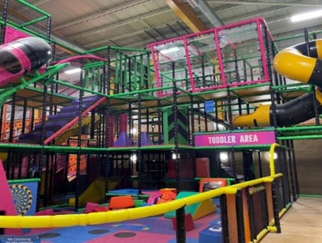 Image of the Abbey Centre Adventure play area featuring colourful soft play apparatus