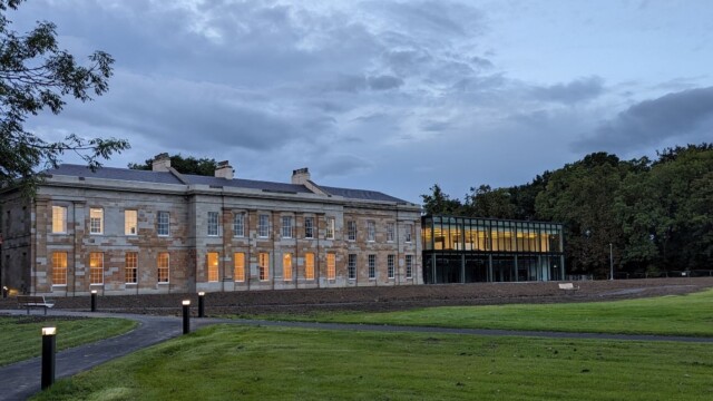 Exterior view of the completed Mount Oswald Georgian Manor House during construction with the modern facilities extension on the right of the building