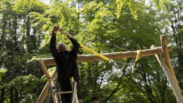 Gentleman checking rope saftey