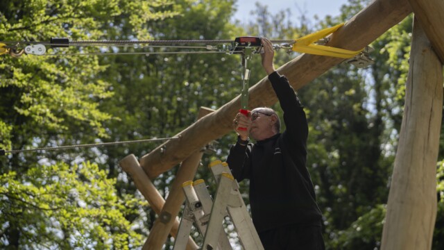 Gentleman checking rope saftey