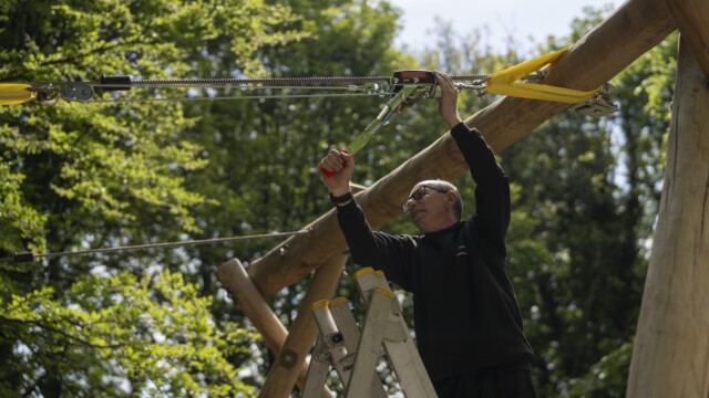 Gentleman checking rope saftey