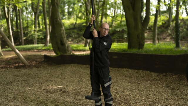 Gentleman checking rope saftey