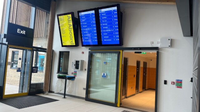 Advertising screens within bus station